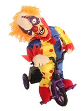 Смешные костюмы - Яркий клоун на велосипеде